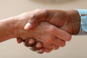 Handshake between a man and woman