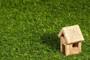 Small wooden house on grass