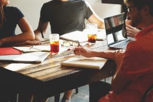 People discussing ideas at a table