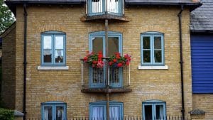 uk style home with blue windows